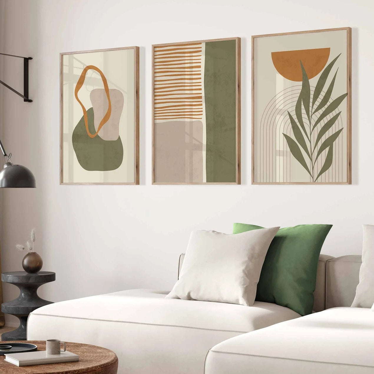 Modern living room with abstract art on the wall and a white sofa.